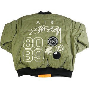 STUSSY ステューシー ×NIKE 23AW REVERSIBLE VARSITY JACKET MEDIUM OLIVE ジャケット オリーブ Size 【L】 【新古品・未使用品】 20807389