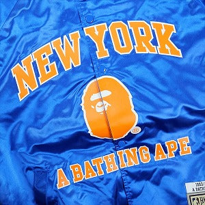 A BATHING APE ア ベイシング エイプ ×MITCHELL & NESS NBA 25AW NEW YORK KNICKS SATIN JACKET BLUE ジャケット 青 Size 【L】 【新古品・未使用品】 20830215
